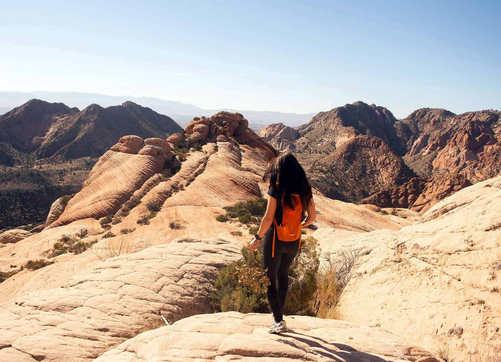 happy woman hiking in southern utah