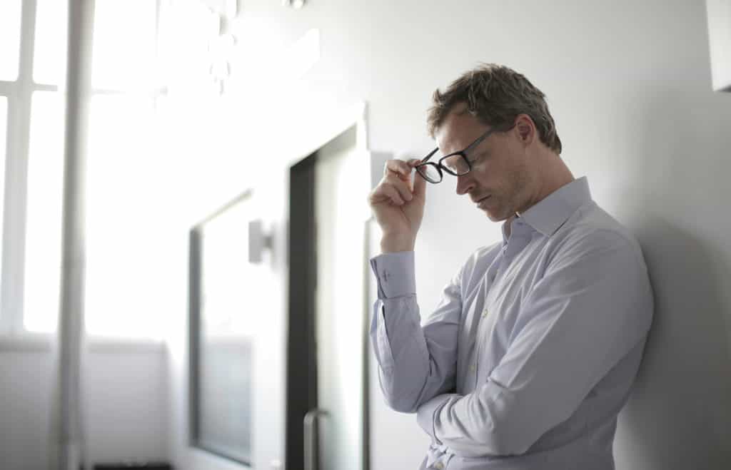 Man contemplating how to overcome PTSD nightmares