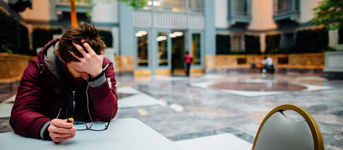 man suffering from depression and anxiety in need of counselling.